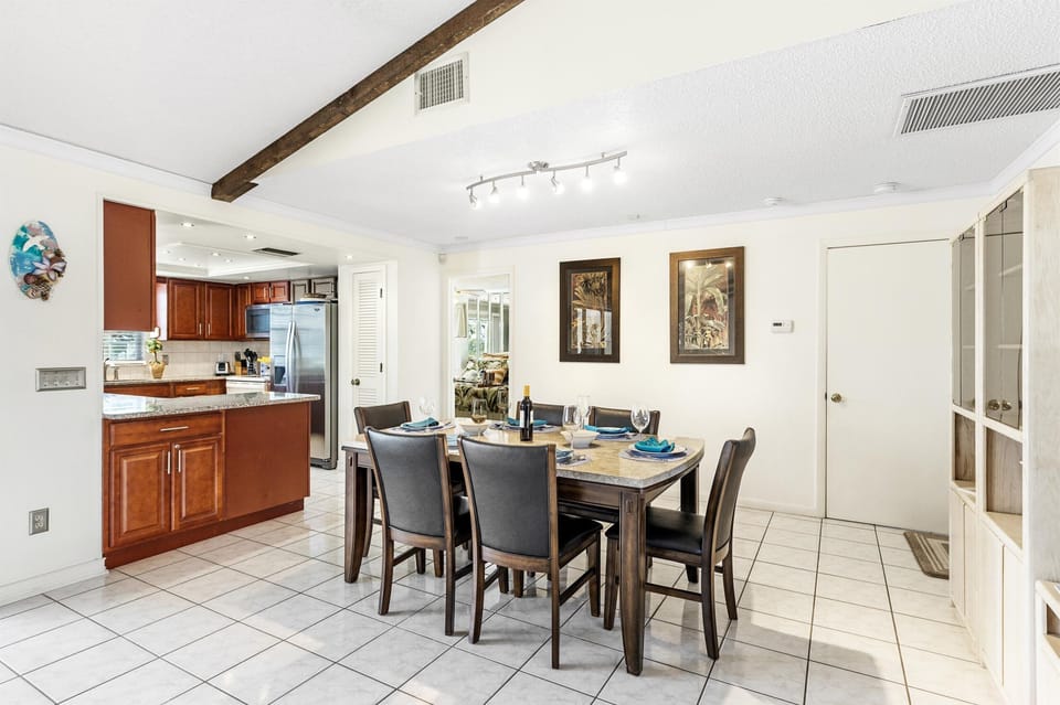 The kitchen is right off of the dining room