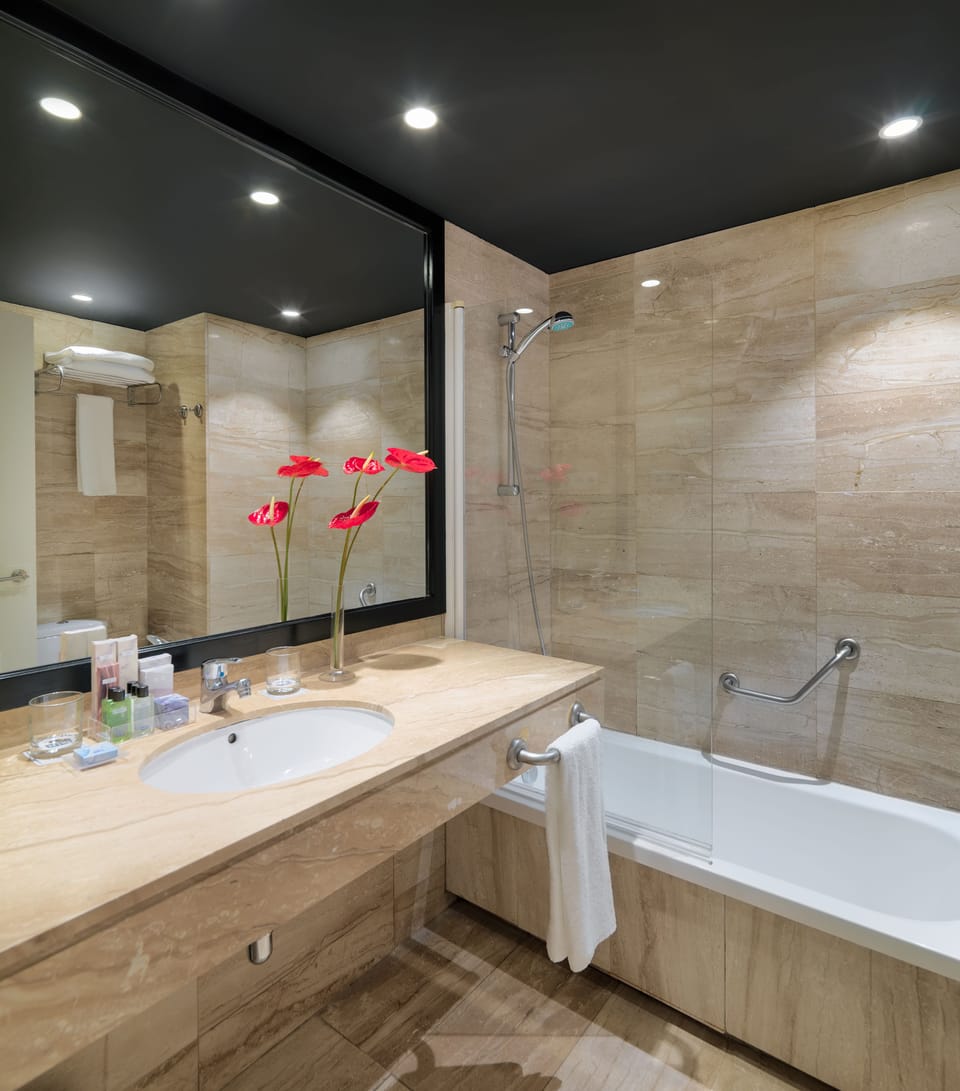 Shower, eco-friendly toiletries, hair dryer, bidet