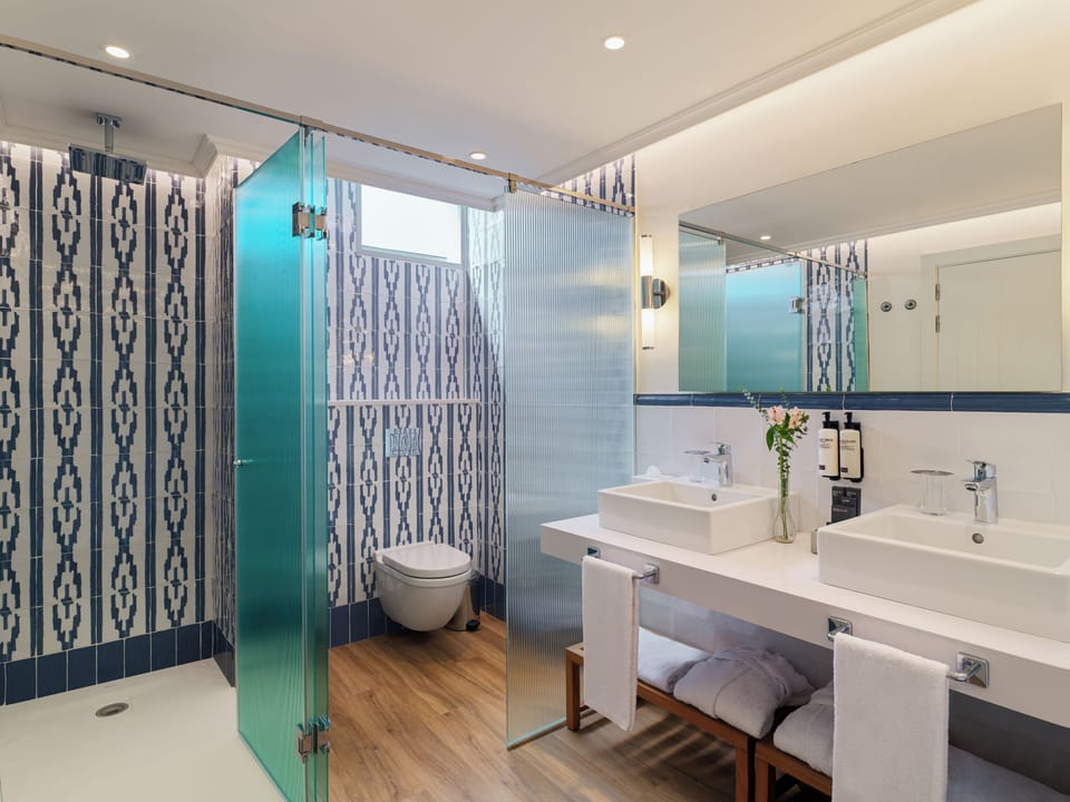 Shower, eco-friendly toiletries, hair dryer, bidet