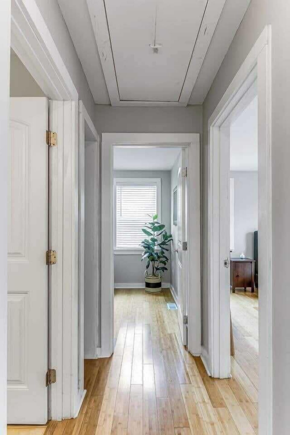 Bedroom 2 straight ahead, Bedroom 3 right, shared bath to the left.