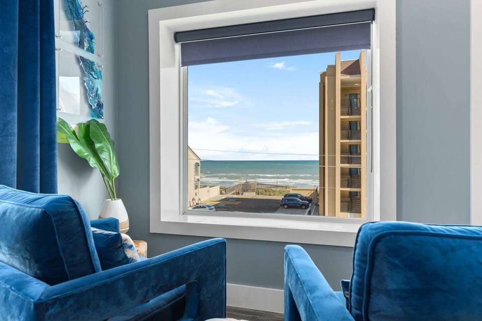 Window views framing endless blue ocean horizons