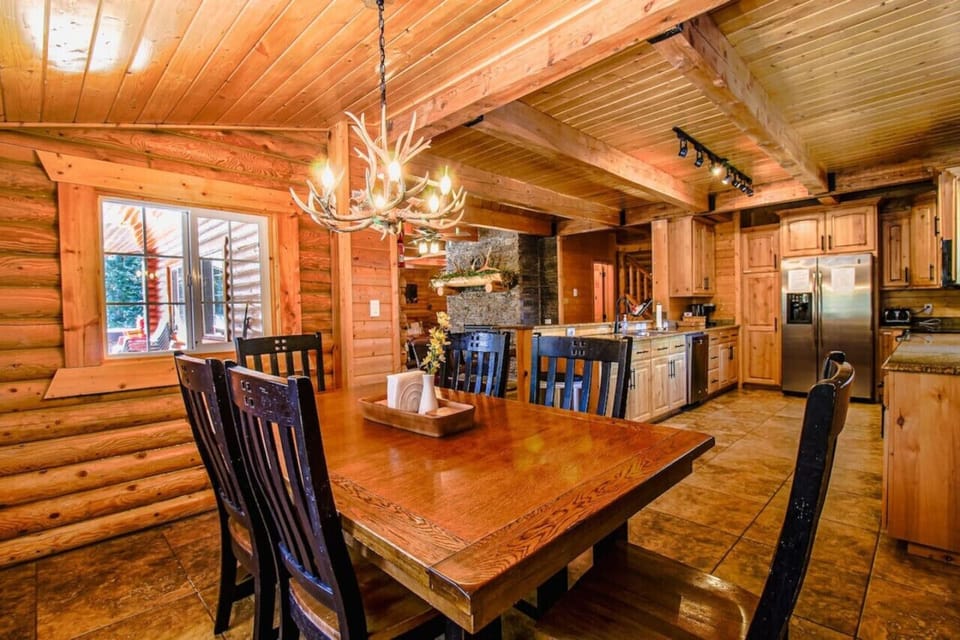 Step into our cozy wooden dining room, the perfect spot for sharing meals and making memories.