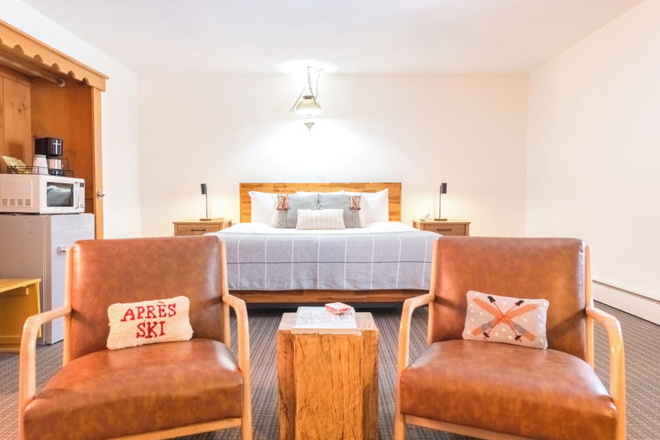 Deluxe Suite, 2 Bedrooms | Hypo-allergenic bedding, desk, laptop workspace, iron/ironing board