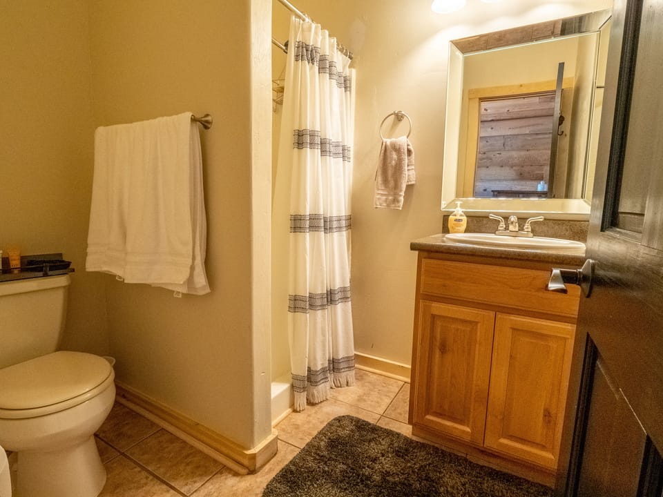 Upstairs master bedroom 2 bathroom with shower.
