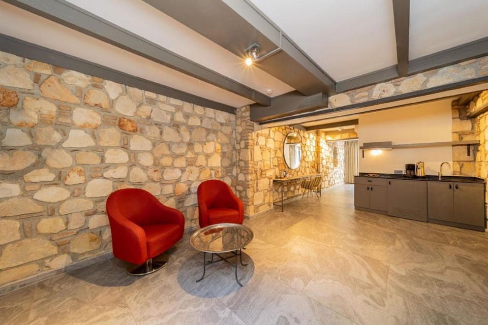 Deluxe Double Room, 1 Bedroom | Living area | TV