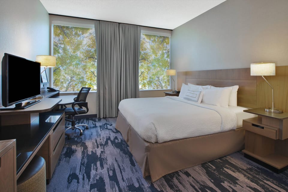 Hypo-allergenic bedding, pillowtop beds, in-room safe, desk