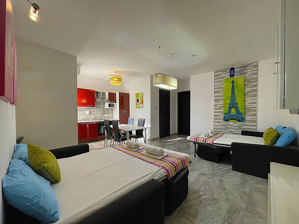 Sofa Bed set up in living room for group of 8