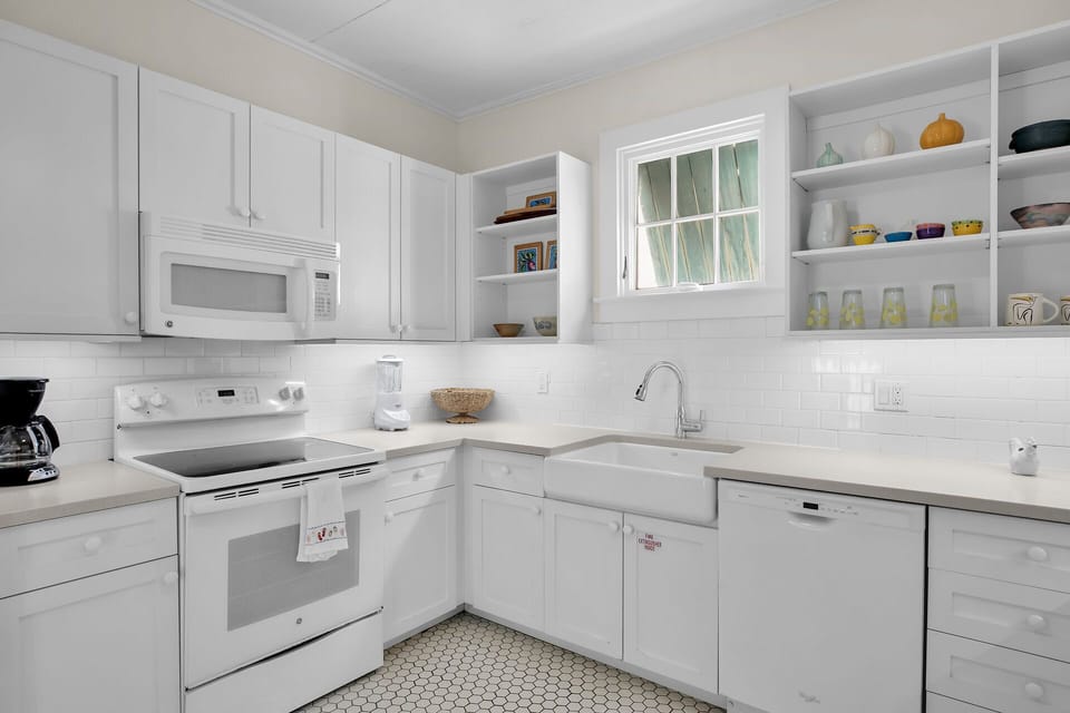 Bright, clean kitchen for meal or snack pep.