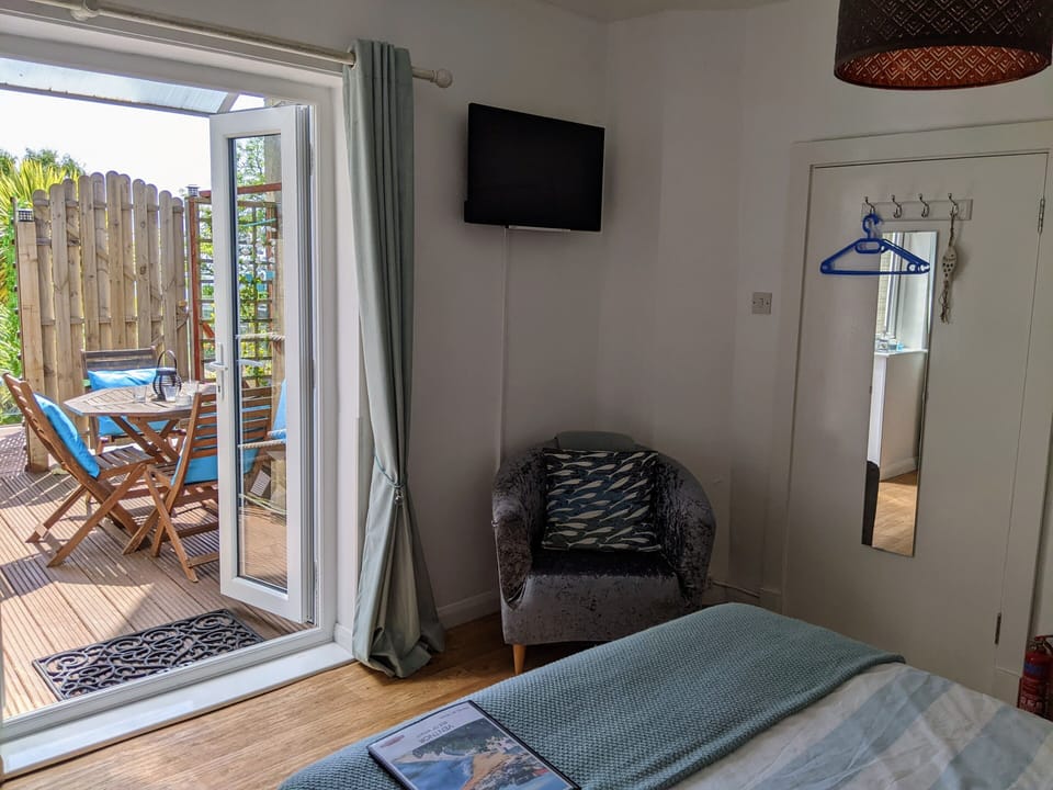 Indoors you also have a comfortable armchair, smart TV and WiFi
