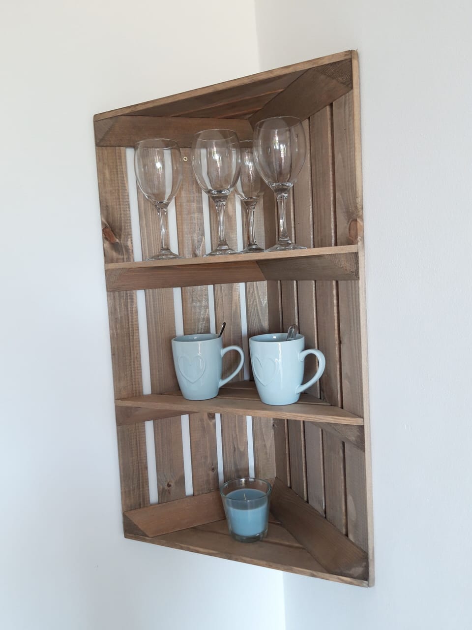 Glasses, mugs, kettle, and a fridge to make your stay with us comfortable