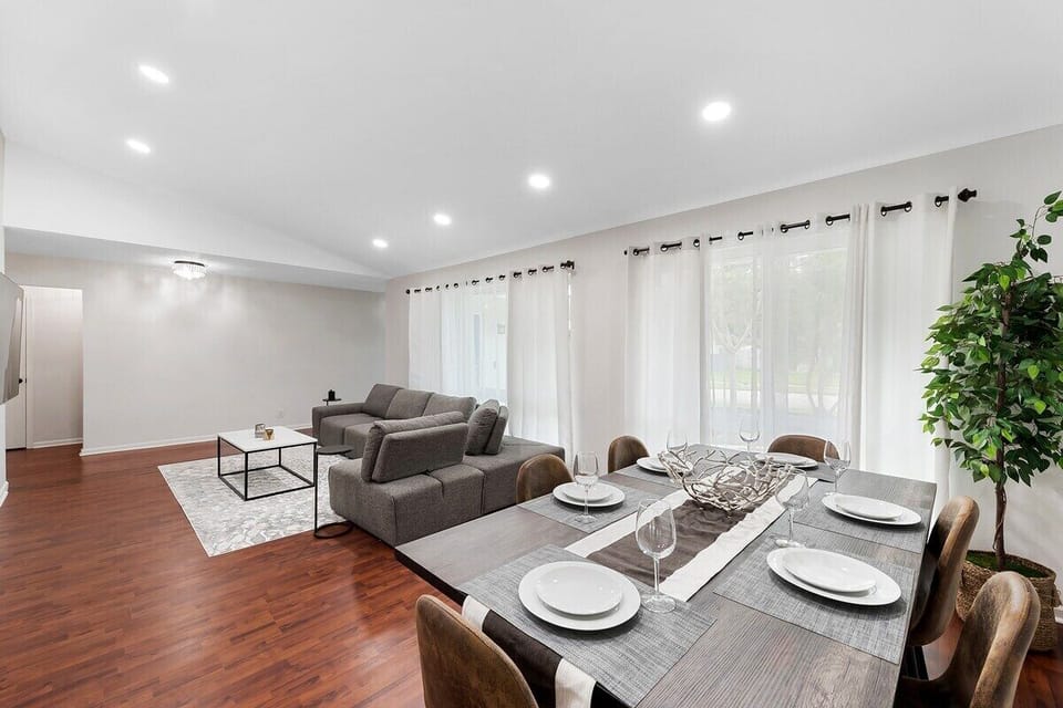 Spread out in the spacious layout of this Fort Lauderdale home, which offers 3 bedrooms & 2 full bathrooms, separate living area with a comfy sofa, a modern dining table, game room with ping pong & foosball tables, large kitchen with updated appliances and bar seating, TV's in all rooms, separate laundry room and contemporary touches throughout!