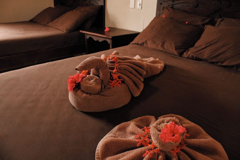 Comfort Suite, 2 Double Beds, Partial Sea View | Blackout drapes, iron/ironing board, free WiFi, bed sheets