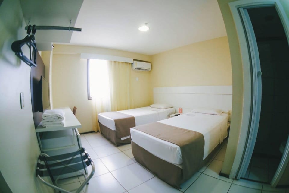 Standard Twin Room, 2 Twin Beds, City View | Minibar, desk, blackout drapes, iron/ironing board