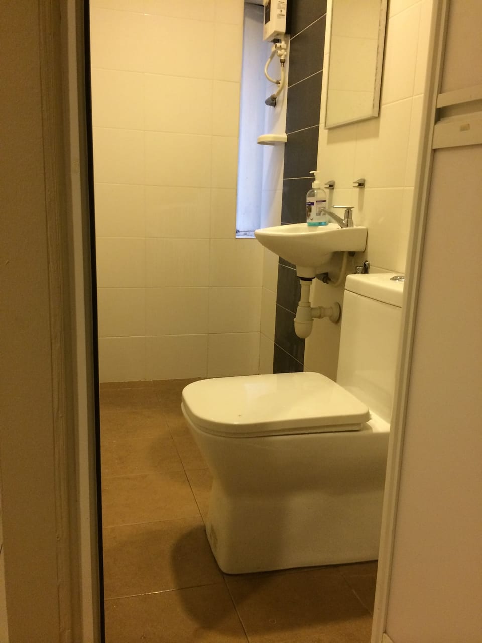 Shower, hair dryer, slippers, towels
