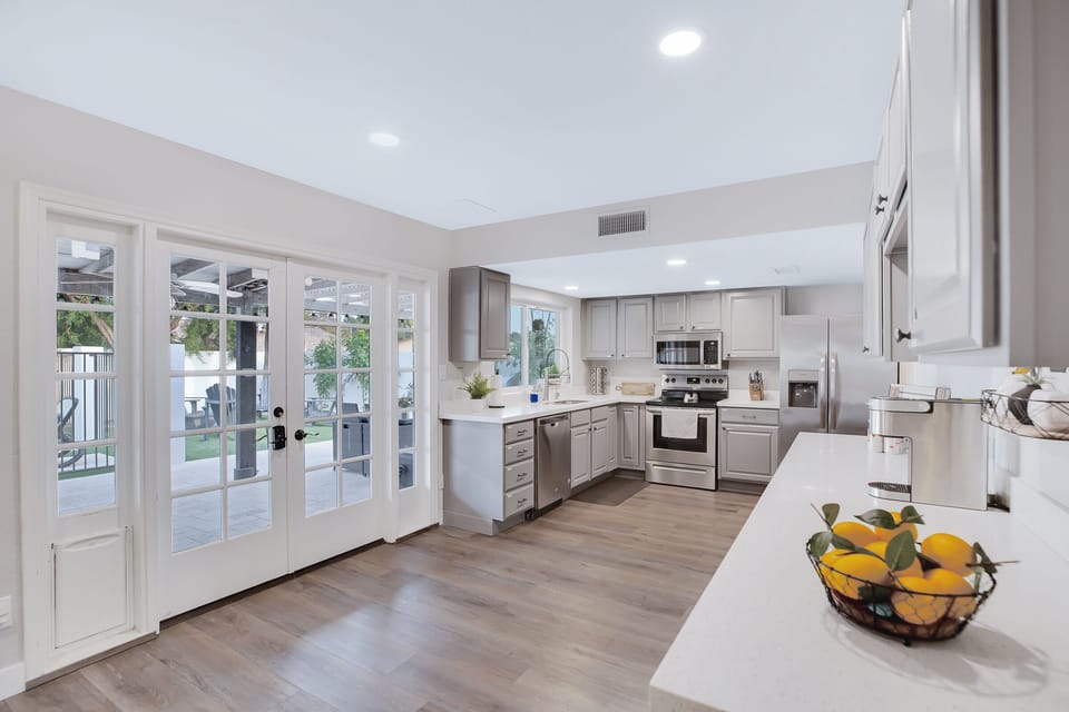 French doors in kitchen leading out to outdoor patio