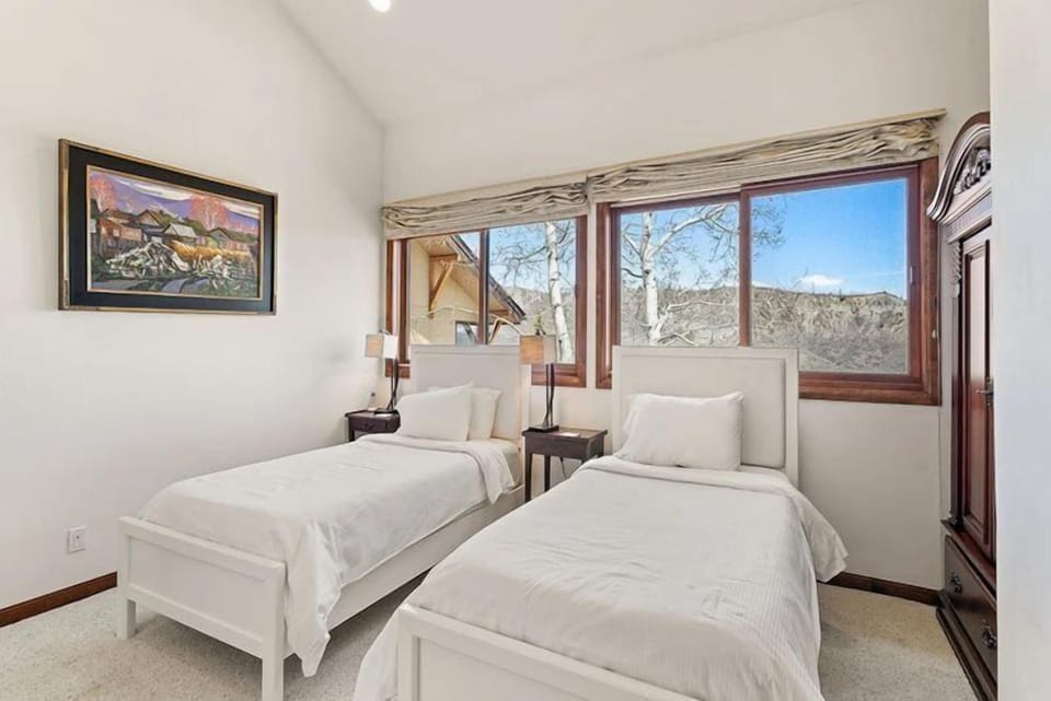 Premier Ski in, Ski out 2 Bedroom Colorado Vacation Rental Steps From the Ski Slopes With Hot Tub and Pool Cabin in Snowmass Village