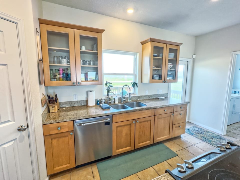 Beautiful cabinets and kitchen window views of the Gul!