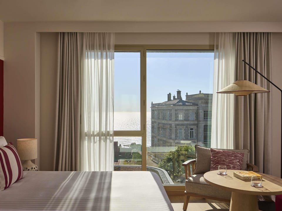 Deluxe Room, 1 King Bed, Ocean View | Premium bedding, down comforters, minibar, in-room safe