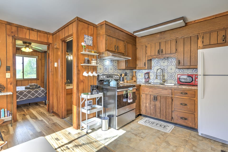 The kitchen has been lovingly updated while retaining its rustic charm