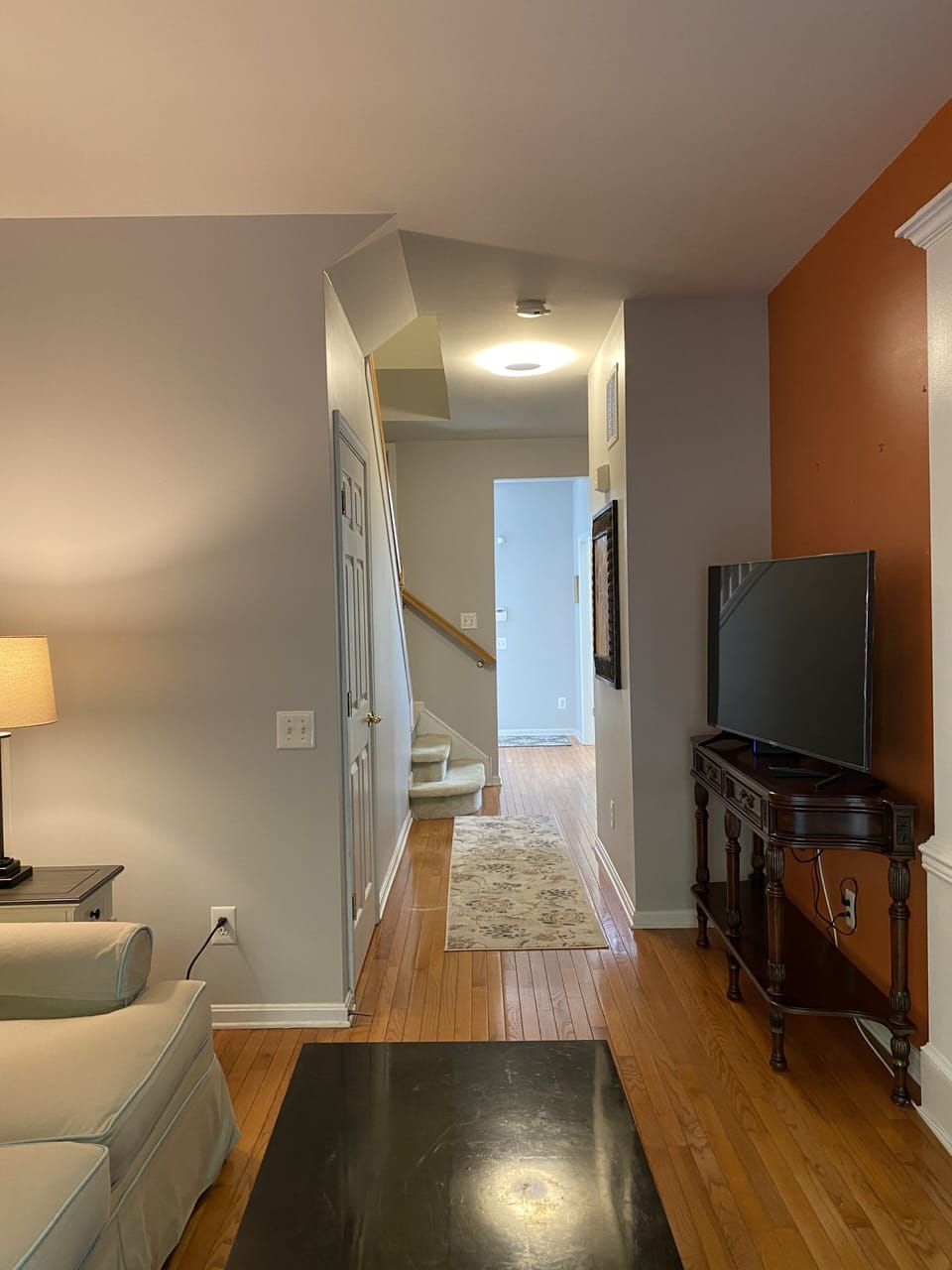 First floor hallway looking toward the entry foyer