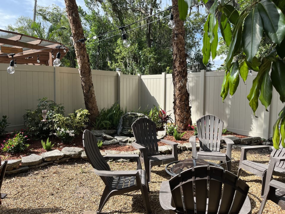Backyard with fire pit and charcoal grill