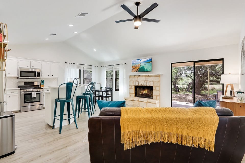 The open living area has sliding glass door access to the backyard