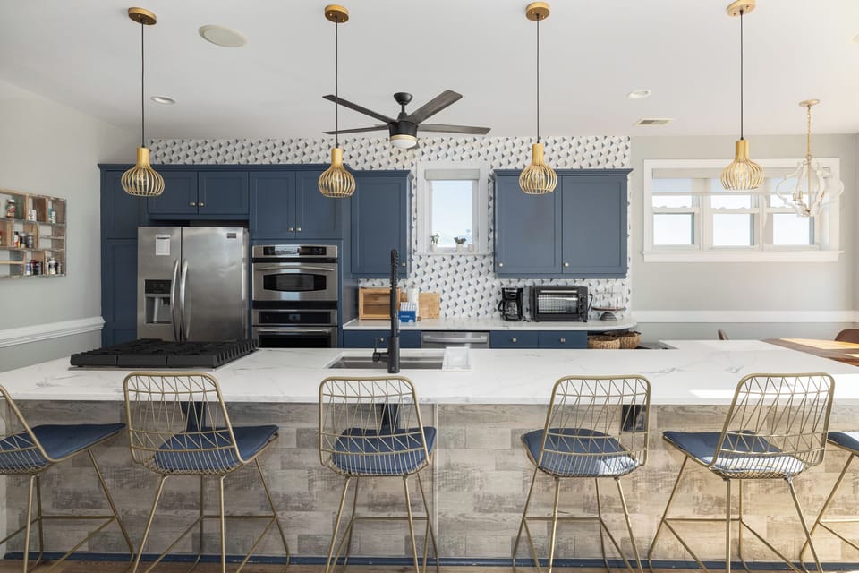A large open-concept kitchen is great for cooking meals for the whole family