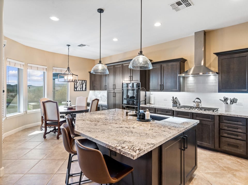 Desert Dreamin: - Granite kitchen with an oversized island. Perfect for making in home meals.