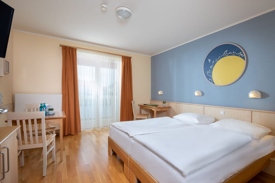 Premium bedding, in-room safe, desk, soundproofing