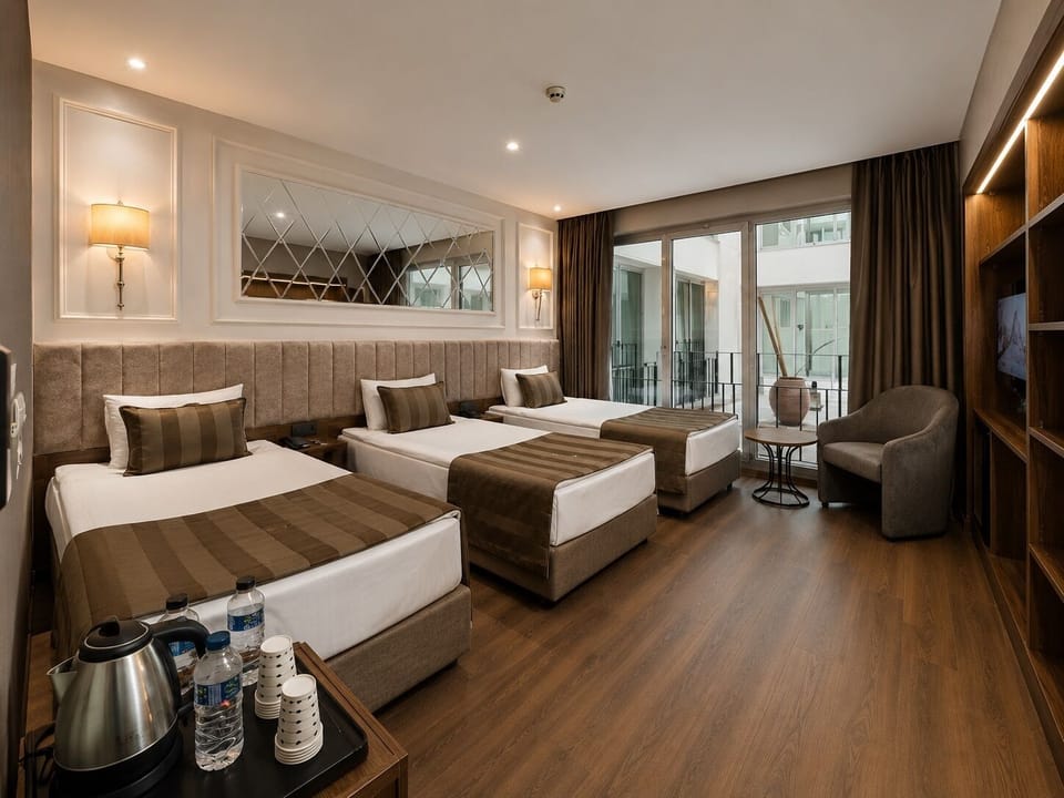 Standard Triple Room, Courtyard View | Egyptian cotton sheets, premium bedding, minibar, in-room safe