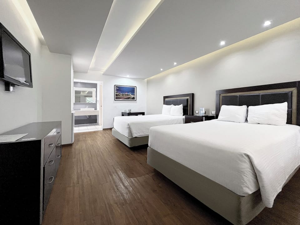 Standard Room, 2 Double Beds | Premium bedding, pillowtop beds, in-room safe, desk