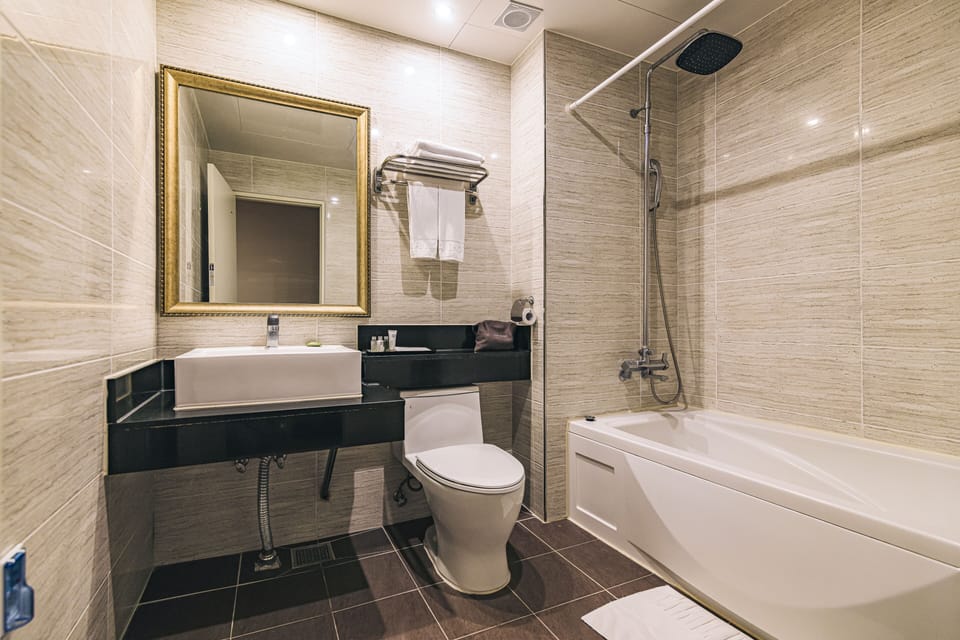 Separate tub and shower, deep soaking tub, hair dryer, slippers