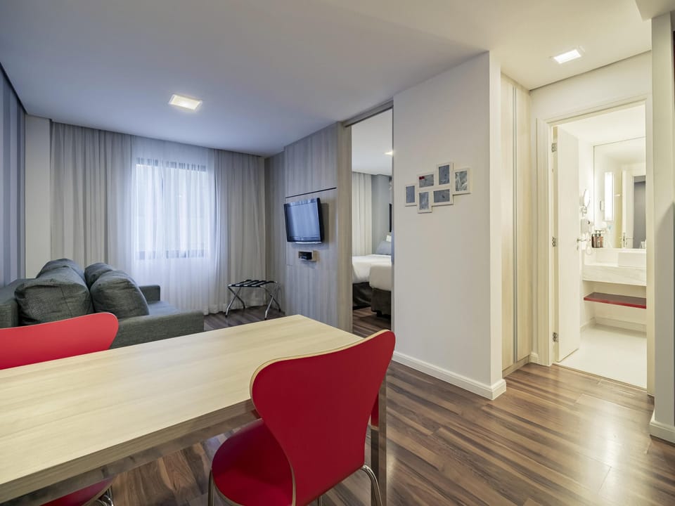 Comfort Apartment, Kitchen | Minibar, in-room safe, laptop workspace, blackout drapes