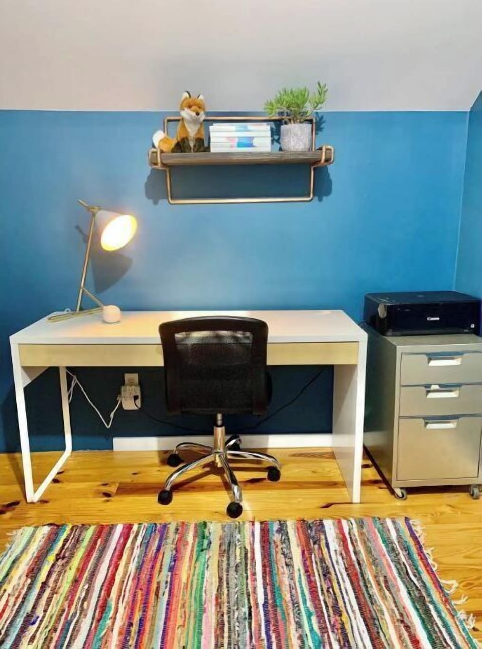 Home office with desk and printer set up