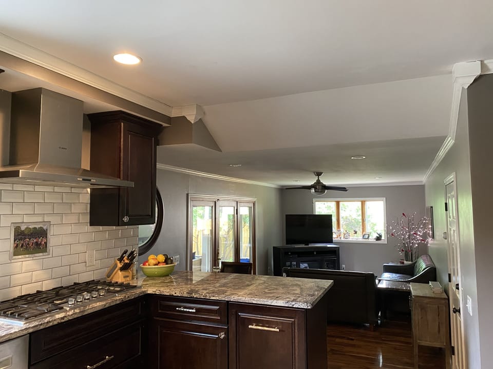 Cozy living room with 48" curved flatscreen TV