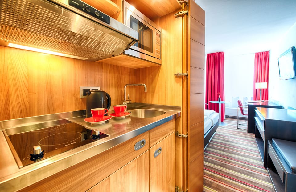 In-room safe, desk, iron/ironing board, free cribs/infant beds