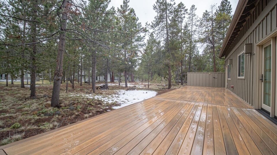 back deck - has BBQ, chairs, and chaise lounge.