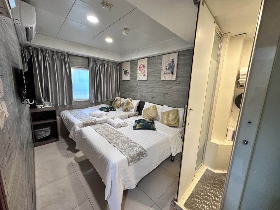 Quadruple Room | Blackout drapes, soundproofing, free WiFi