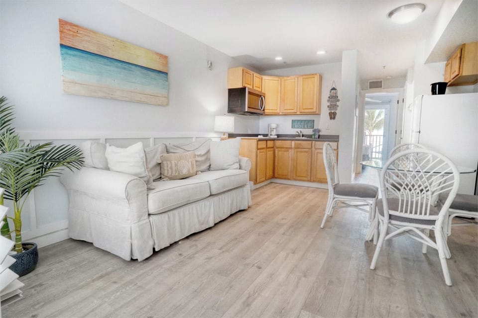 Suite, 1 Bedroom | Living area | 50-inch TV with cable channels