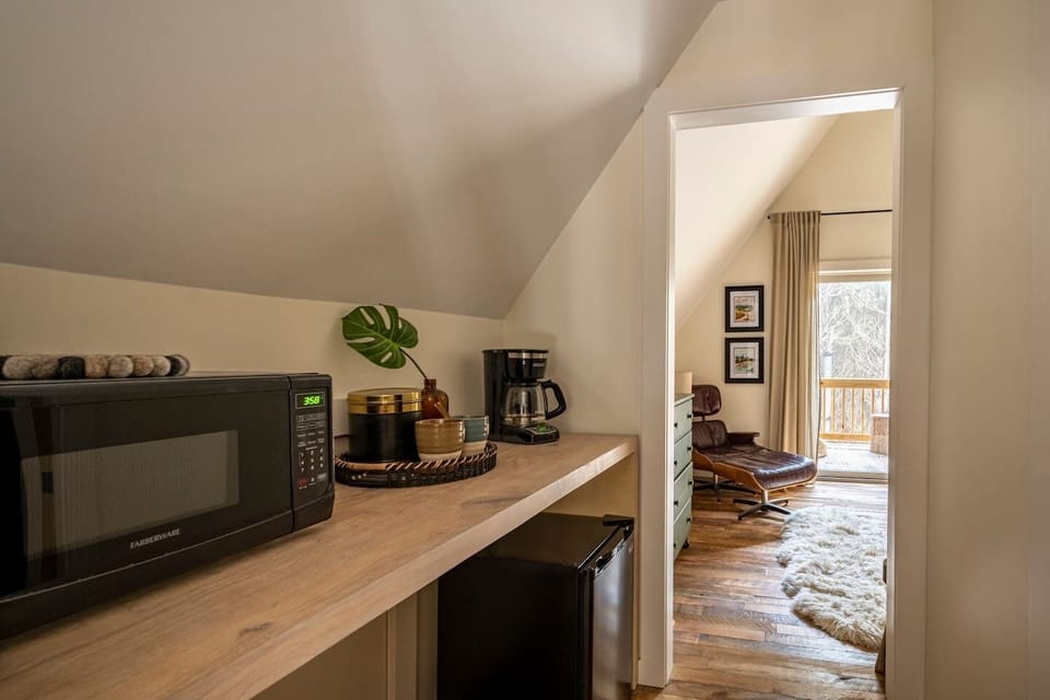 The loft suite has a mini microwave, mini fridge, and coffee maker