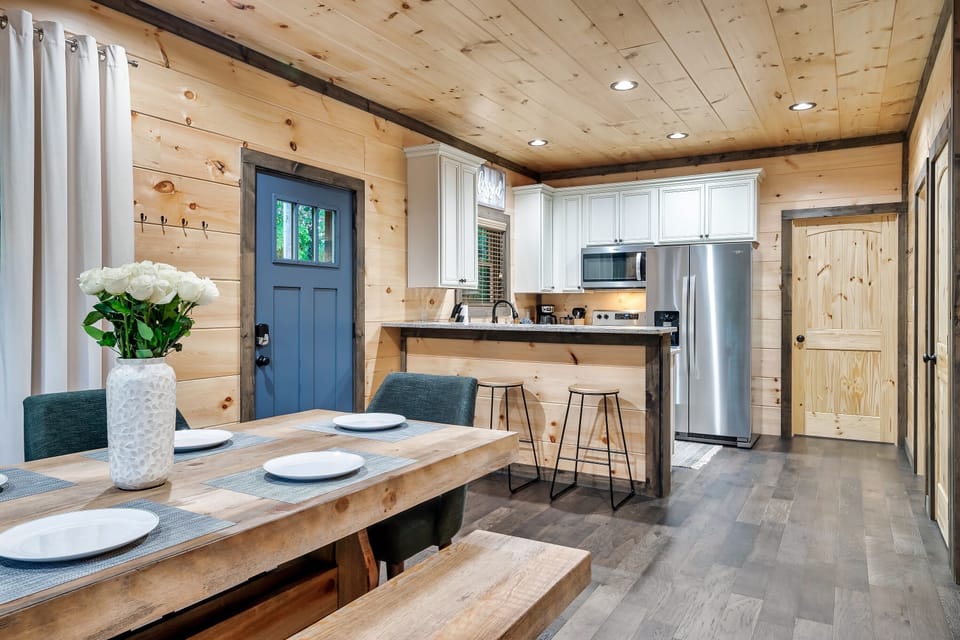 A fully equipped kitchen has modern appliances