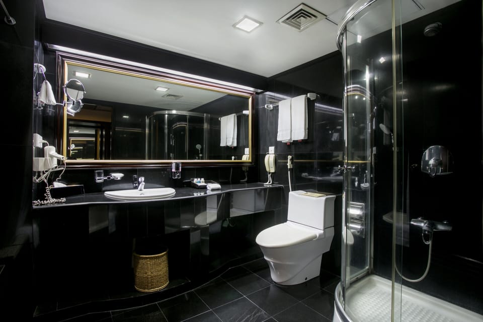 Premium Room | Bathroom | Separate tub and shower, deep soaking tub, rainfall showerhead