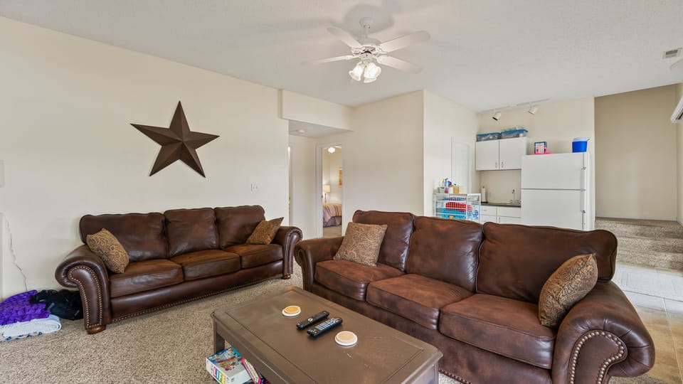 Huge space for family fun and games.
Bedrooms and Bath through hallway.