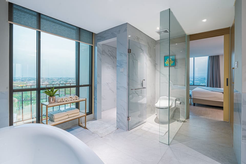 Presidential Suite | Bathroom | Rainfall showerhead, hair dryer, slippers, towels