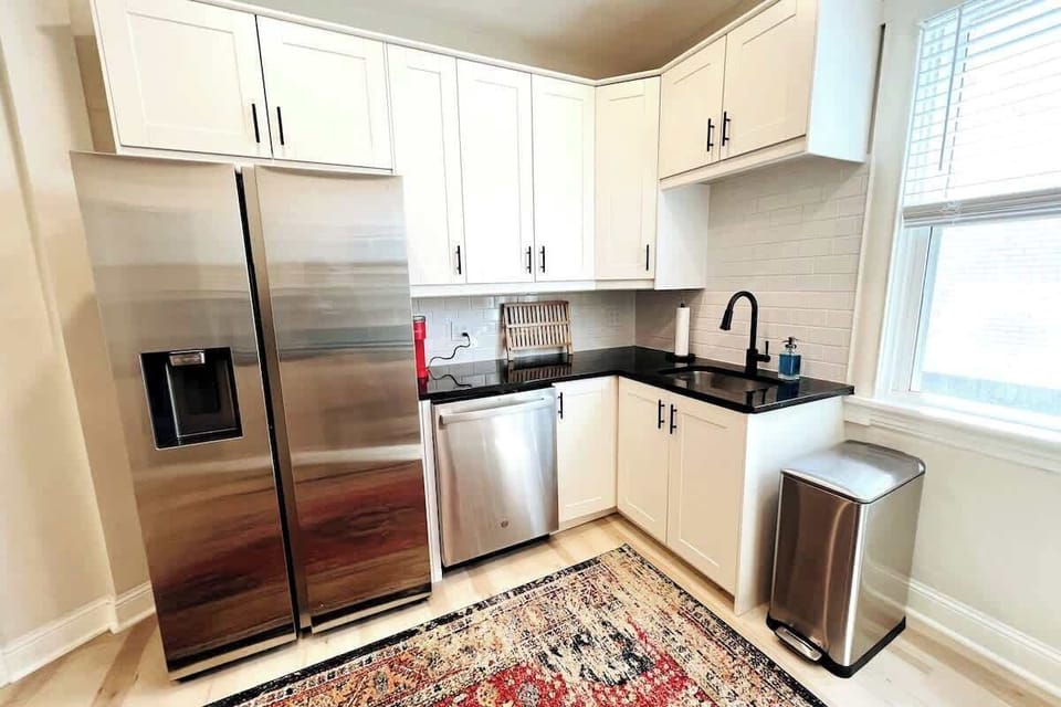 Kitchen has full sized fridge and dishwasher (perfect for longer stays). 
