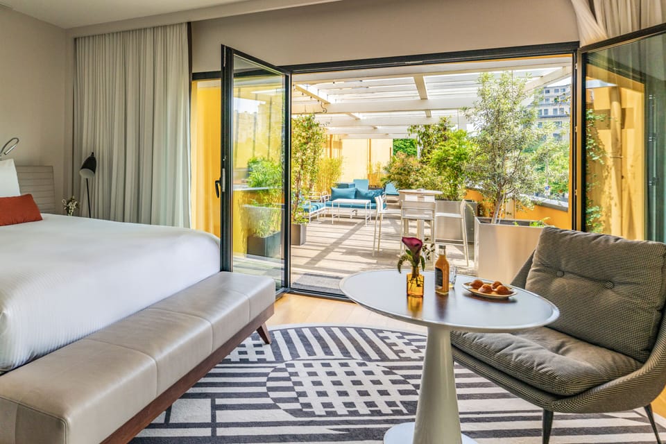 Executive Room, 1 King Bed, Terrace (Paris view) | Free minibar, in-room safe, desk, blackout drapes