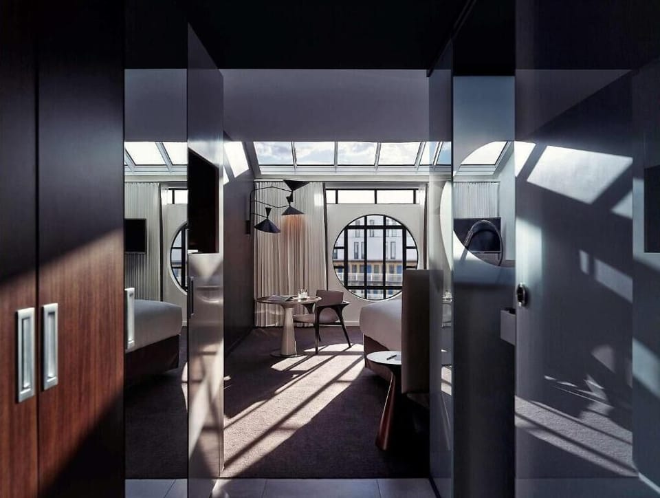 HUBLOT Executive Room, 1 King Bed, Pool View | Free minibar, in-room safe, desk, blackout drapes