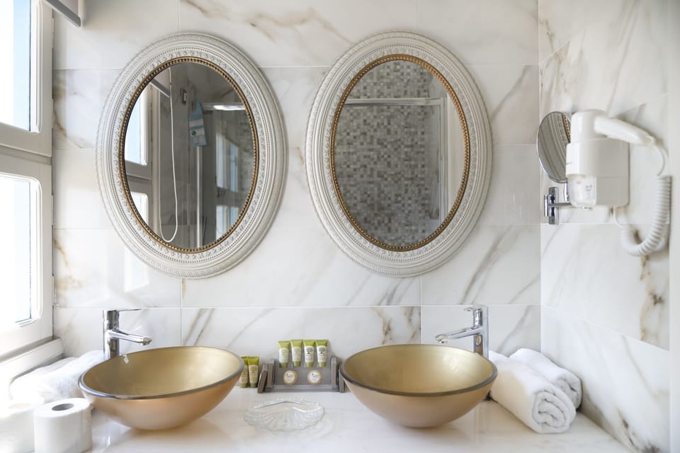 Junior Suite, Sea View | Bathroom | Designer toiletries, hair dryer, towels, soap