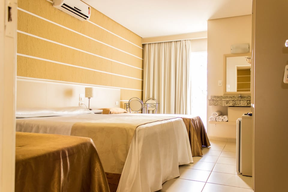 Quadruple Room | Minibar, in-room safe, free WiFi, bed sheets