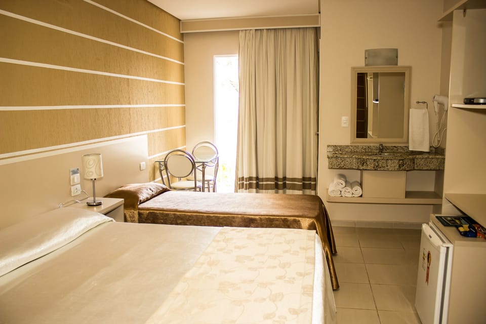 Triple Room | Minibar, in-room safe, free WiFi, bed sheets